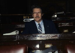 House Floor, Sitting at desk