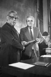 Matt Ryand and K. Leroy Irvis holding a gavel