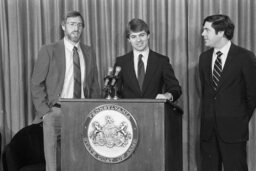 Standing At Podium, Group Photo, Staffer