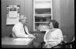 District office speaking with staff