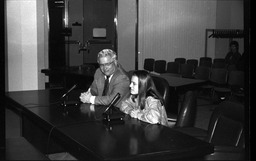 In a committee room with a group of students