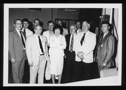 Representatives on a tour viewing robotic machinery