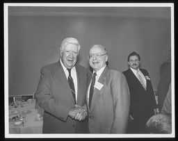 Rep. Kenneth J. Cole shaking hands with U.S. Speaker Tip O'Neill