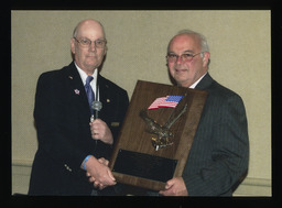 David Lawrence giving Fraternal Order of the Eagles Award to John Siptroth