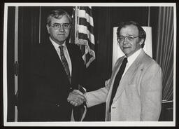 Rep. Matthew J. Ryan and Rep. Kenneth E. Brandt shaking hands