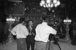 Press interview by Staffer, Cameraman, Governor's Reception Room, Members
