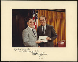 Signed photograph from Governor Thornburgh. Gov. Thornburgh and Rep. Dorr hold a bill signing pen.