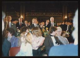 Swearing-In day January 1987, on the House Floor with many members surrounding Rep. Burns