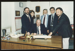 Rep. Edward Burns at his district office with staff.
