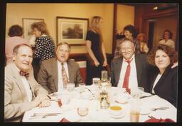 Undated, Rep. Thomas Tangretti seated at a table with guests.