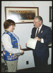 Rep. Tangretti gives award to girl scout