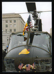 A close-up view of the helicopter known as "America's Huey - 091."