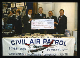 Members of the House of Representatives present a check to the Civil Air Patrol-PA Wing.